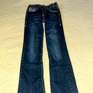 Show jeans. Dark rinse, light stitch.